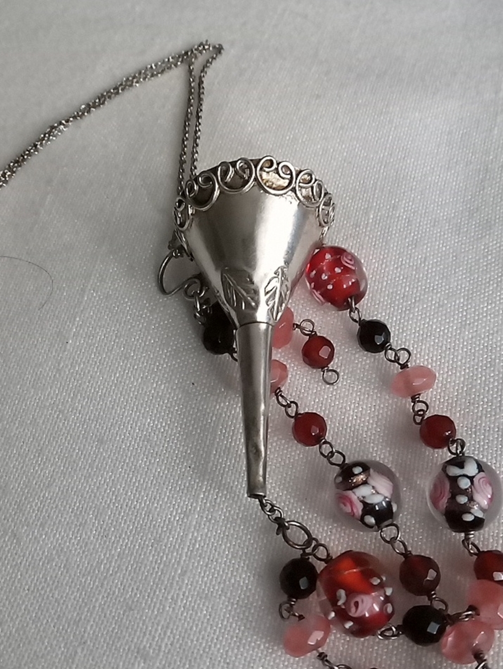 Silver Cone Pendant Necklace with Red and Pink Beads